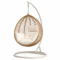 Sedia sospesa in rattan e acciaio con cuscini in cotone bianco